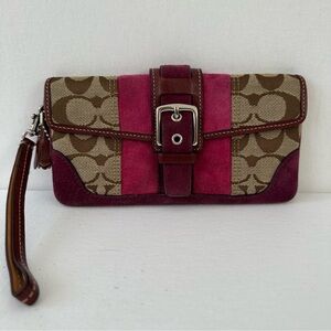 Coach wristlet. Pink and purple suede with signature logo fabric.